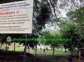 Penaburan Benih Ikan di Telaga Namberan